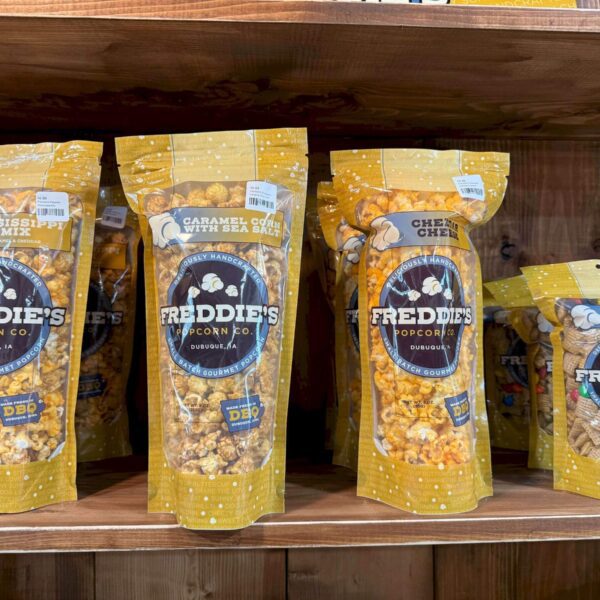 A variety of Freddie's Popcorn on a shelf.
