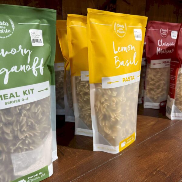 A variety of Pasta on the Prairie on a shelf.